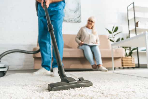 Efficient Aged Care Cleaning in Cozy Living Room - Harmony of Productivity and Relaxation